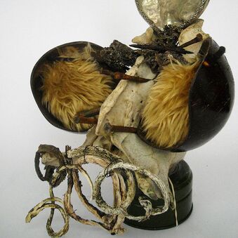 sculpture made of coconut, bone, metal, fur